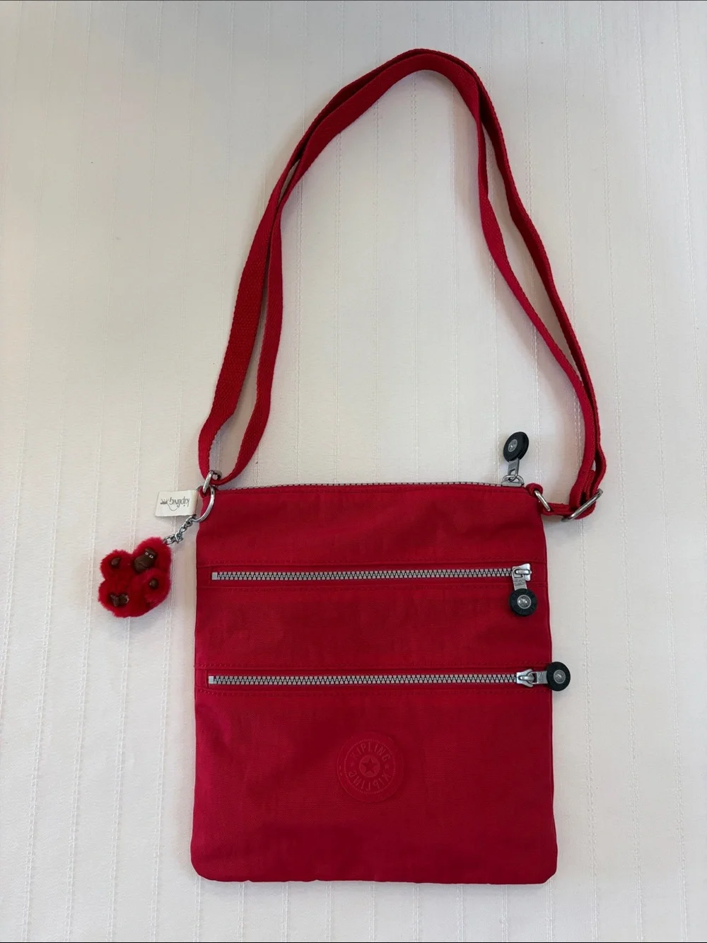 Kipling Red Crossbody with Playful Pom Charm